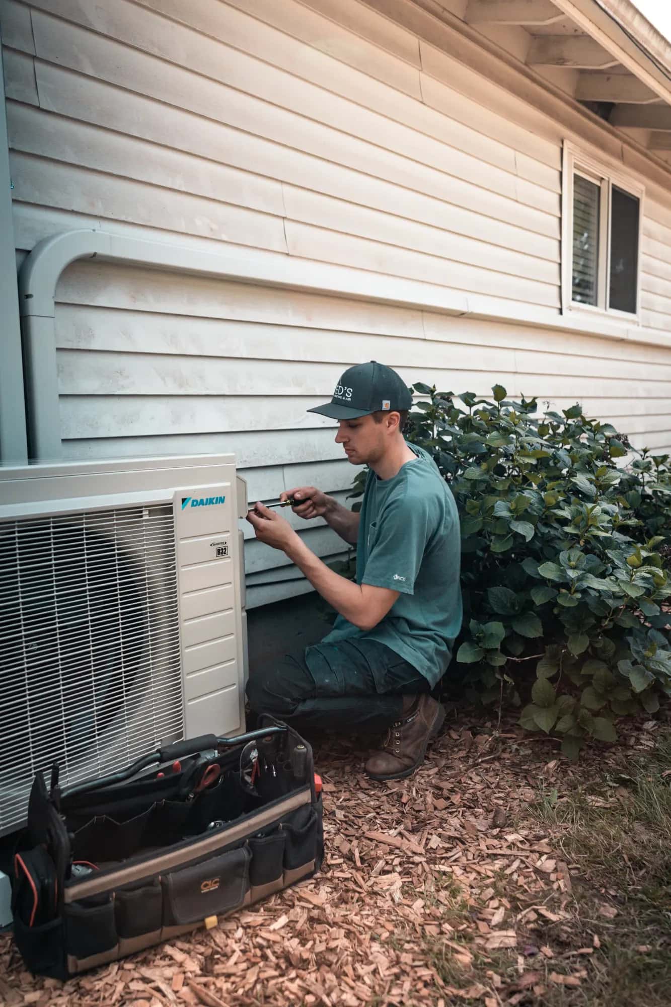 Close-up of a newly installed ductless mini-split outdoor condenser